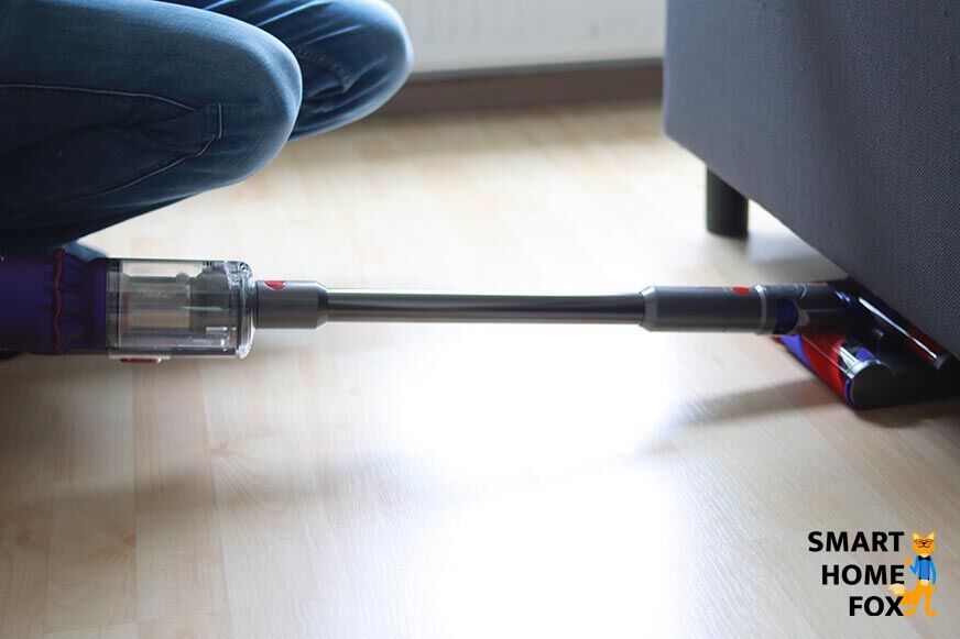Vacuuming with the Omni-glide under the bed